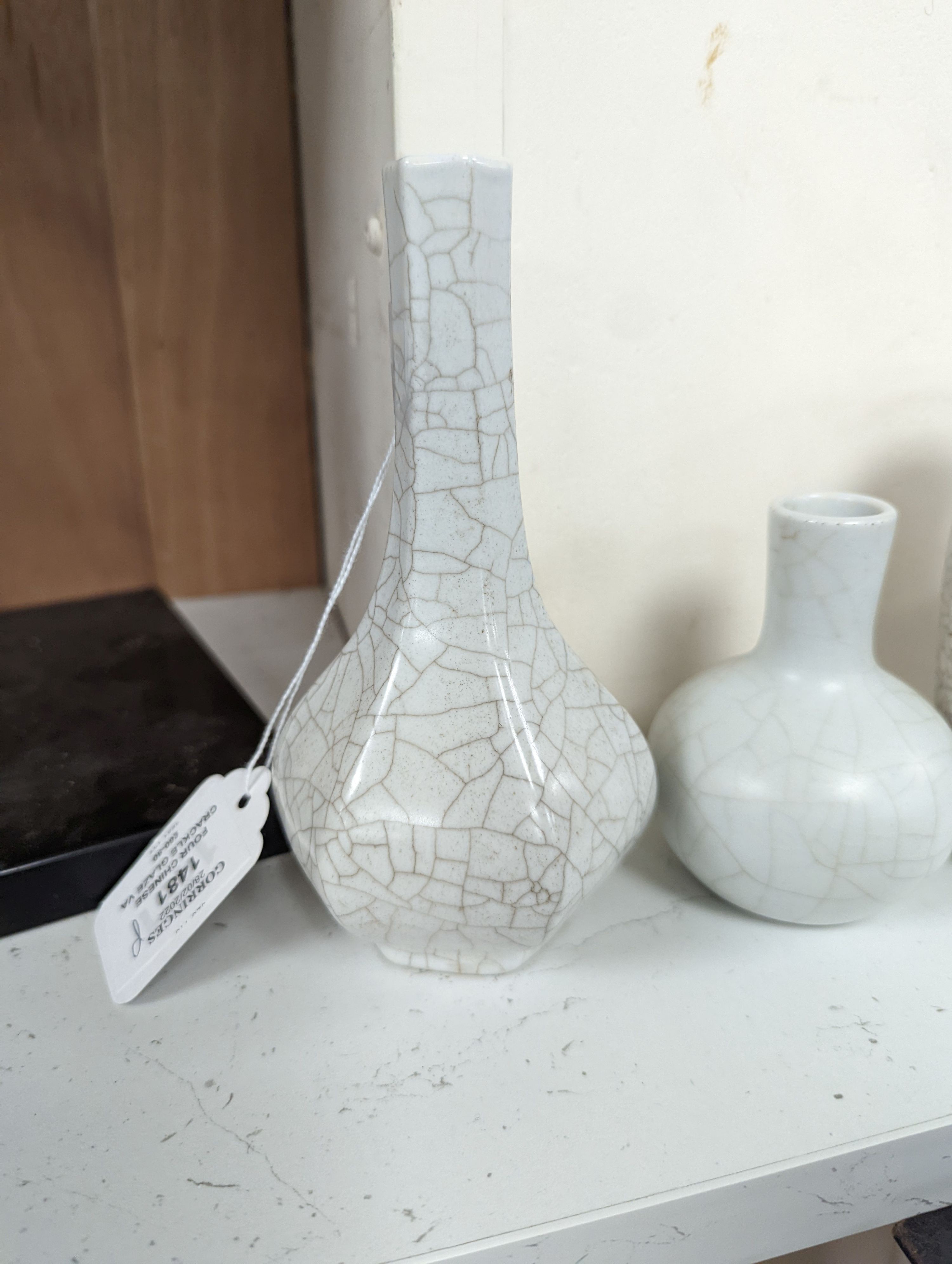 Four Chinese crackle glaze vases, tallest 16 cms high.
